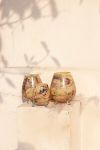 Jamillia brown round glass hurricane lantern on feet L 3